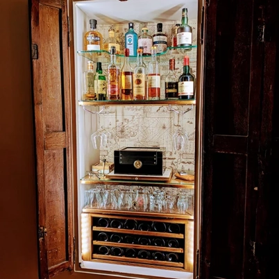 Custom-made cabinet with mini bar in rustic oak