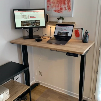 Height-adjustable desk with custom oak top