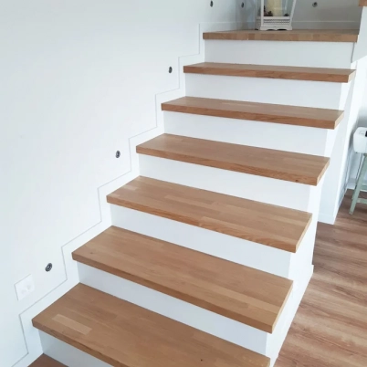 Quarter-turn staircase with solid wood steps