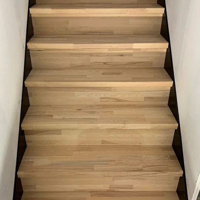Custom-made staircase with steps and risers in solid beech