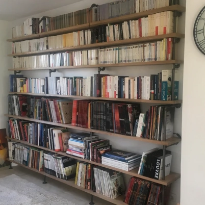Oak bookshelf with cast-iron pipes