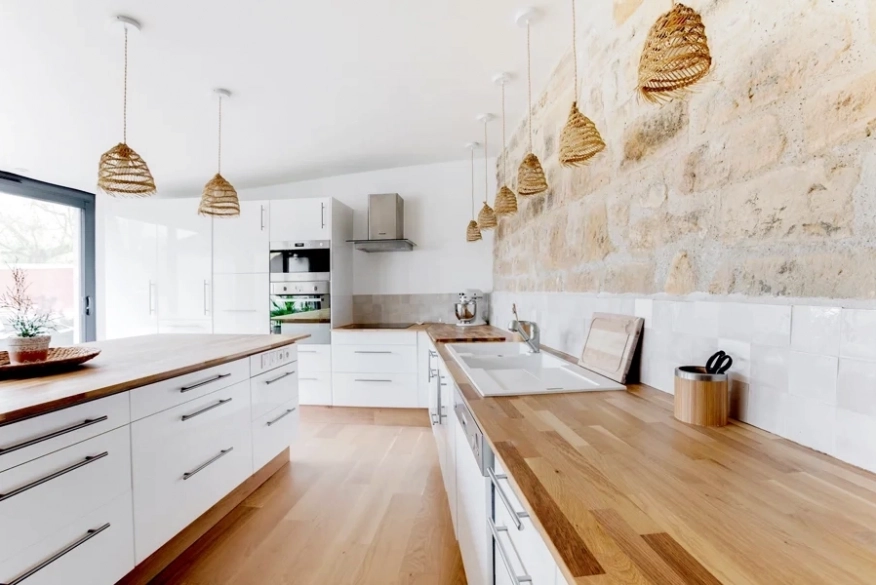 Kitchen with custom natural solid oak worktop
