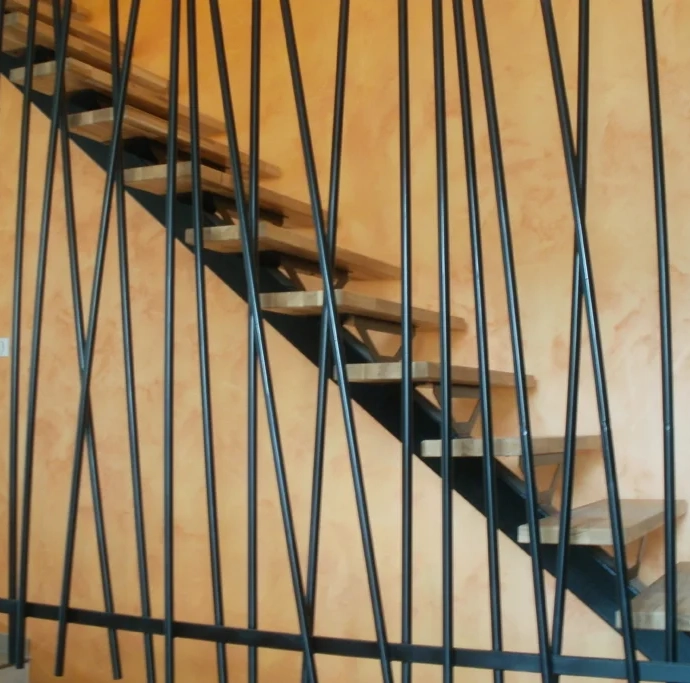 Projet de fabrication d'un escalier avec limon central en acier et marches en bois