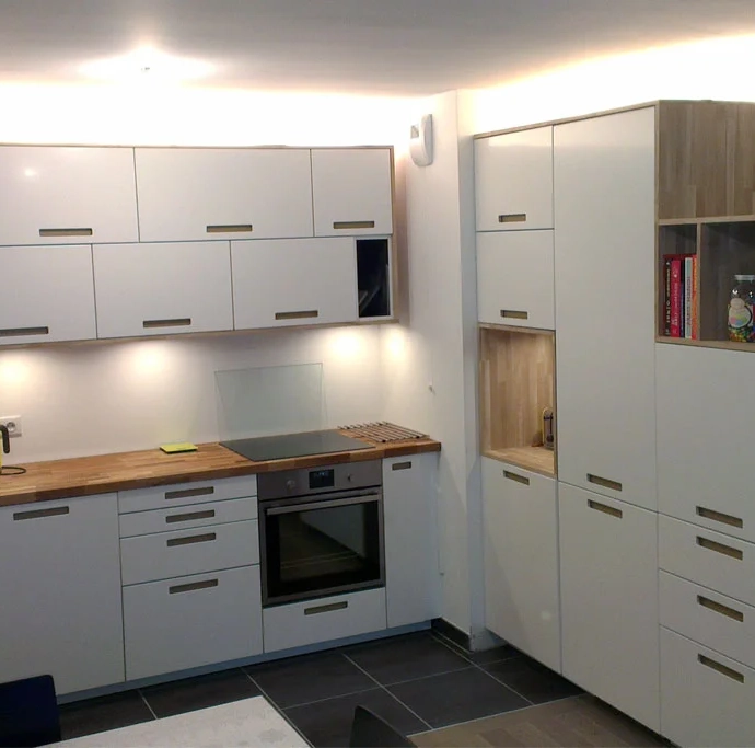 Custom kitchen layout with custom cut solid oak panels