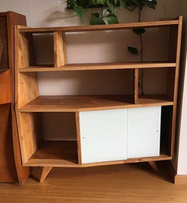 Asymmetric bespoke oak storage cabinet