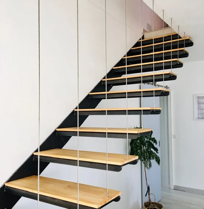 Suspended staircase with custom wooden steps