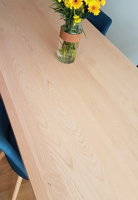 Custom-made table top in beech cabinetry