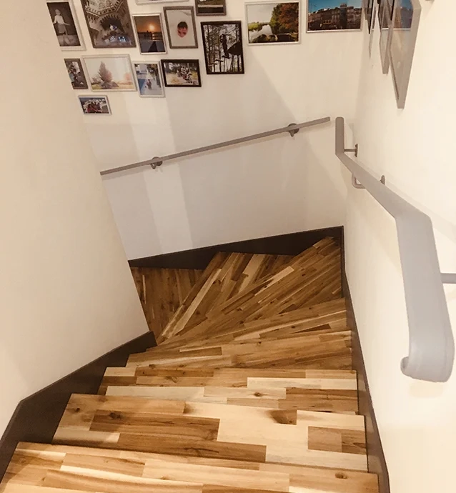 Concrete staircase cladding with custom acacia wood steps