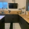 Kitchen with central island in solid oak