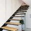 Suspended staircase with custom wooden steps