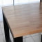 Solid wood table top with rectangular metal legs