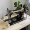 Singer sewing machine on solid acacia top