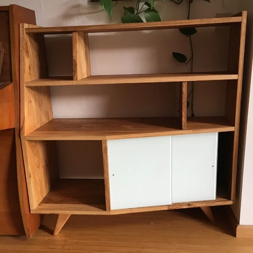 Asymmetric bespoke oak storage cabinet